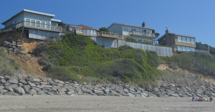 houses on eroded cliff 